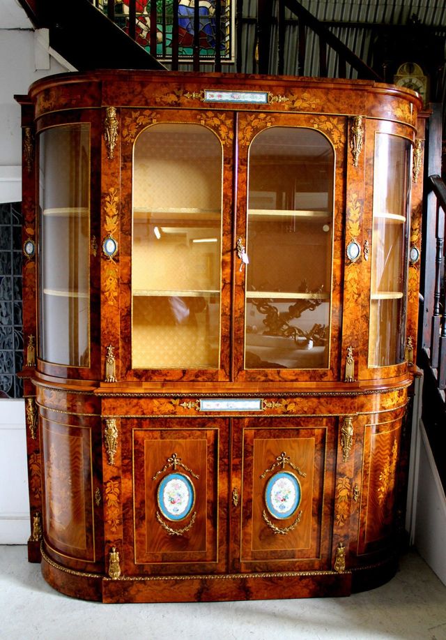 Antique walnut deals china cabinet